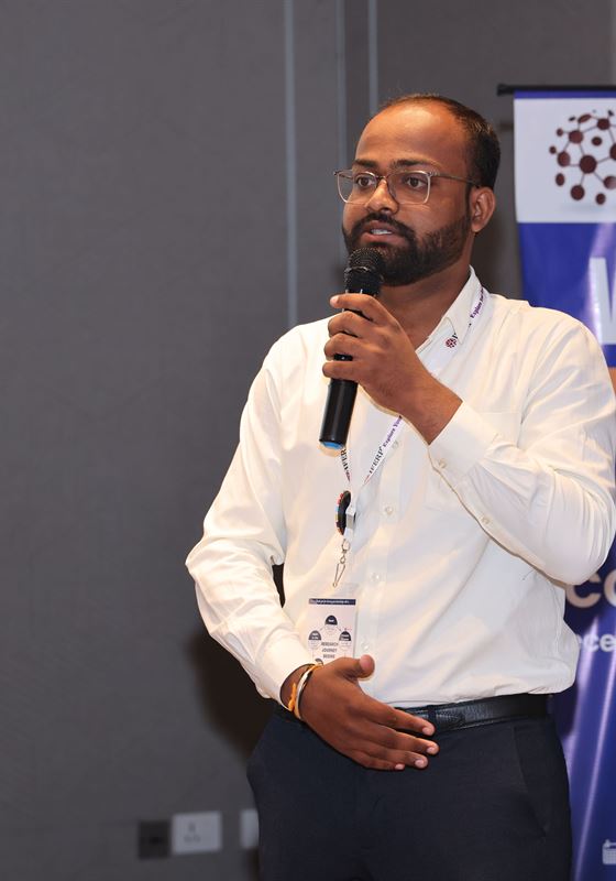 Speaker addressing delegates at a past ICASET conference